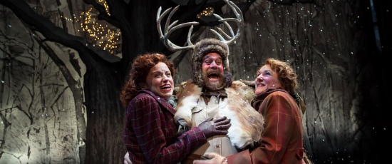 Mistresses Ford (Heidi Kettenring, left) and Page (Kelli Fox) with the antlered Falstaff (Scott Jaeck) at Chicago Shakespeare Theater. (Liz Lauren)