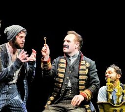 Black Stache (John Sanders, center) knows that where there's a key, there must be a treasure chest. (Broadway in Chicago)