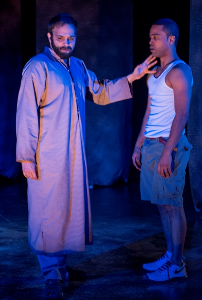 Elliot (Edgar Miguel Sanchez, right) confronts a spectral figure (Anish Jethmalani) in 'Water by the Spoonful.' (Michael Brosilow)