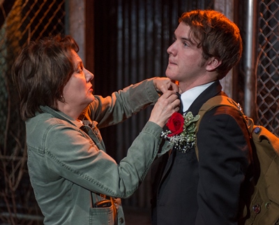 Beth (Natalie West) helps Jonathan (Matt Farabee)  with his bow tie in 'Mud Blue Sky' at A Red Orchid. (Michael Brosilow)