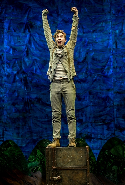 Peter (Joey deBettencourt) revels in his freedom as he guards a special trunk in 'Peter and the Starcatcher.' (Terry Shapiro)