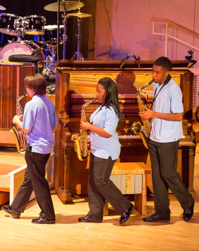 Musicians in the Kenwood Academy Jazz Band proceed to the stage. (Todd Rosenberg)