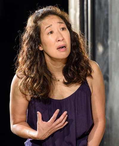 Paulina (Sandra Oh) pleads with her husband to believe that the strange man in their home is her former tormentor. (Michael Courier) 