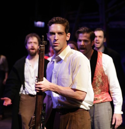 Lee Harvey Oswald (Nathan Gardner) hears his progenitors urge action in Dallas in 'Assassins' by Sondheim and Weidman for Kokandy Productions (Joshua Albanese).