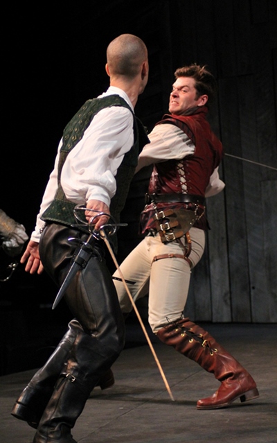 Tybalt (Eric Parks, left) and Mercutio lay on in the public square. (Carissa Dixon)