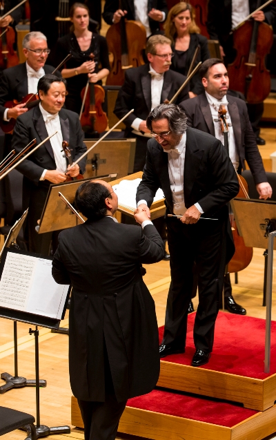 Chicago Symphony music director Riccardo Muti and concertmaster Robert Chen share a congratulatory moment. (Todd Rosenberg)