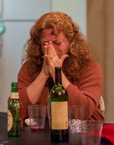 Deirdre Blake (Hanna Dworkin) knows the bad news her husband is about share with their daughters in 'The Humans.' (Michael Brosilow)