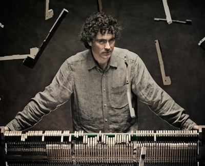 This isn't Beethoven destroying another piano, but pianist Paul Lewis deep into the composer's music. (Joseph Molina)