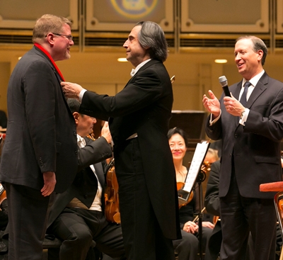 Retired CSO principal bassoonist David McGill received the Theodore Thomas Medallion from music director Riccardo Muti and CSO preside
