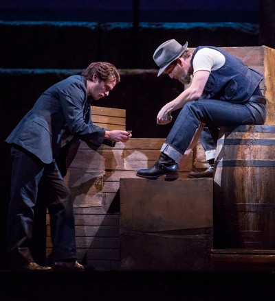 Billy Bigelow (Steven Pasquale) is easily led further astray by Jigger (Jarrod Emick) in Lyric Opera of Chicago's 'Carousel.' (Todd Rosenberg)