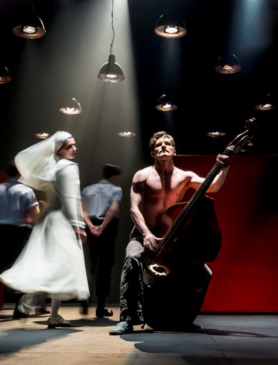 In a dreamlike episode, Isabella (Anna Khalilulina) whirls around her condemned brother Claudio (Petr Rykov) as he plucks a double-bass. (Johan Persson)