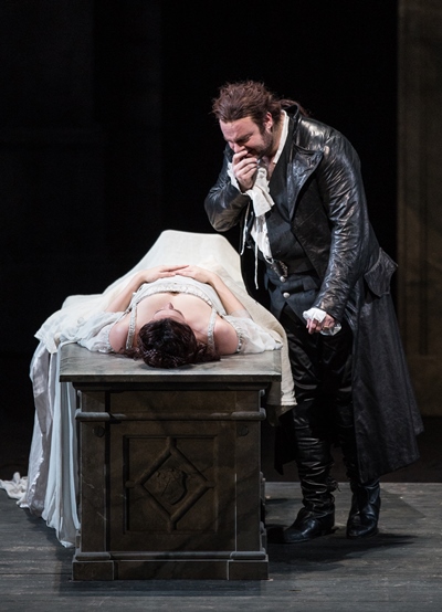 Romeo (Joseph Calleja) grieves over his apparently dead Juliet (Susanna Phillips). (Todd Rosenberg)