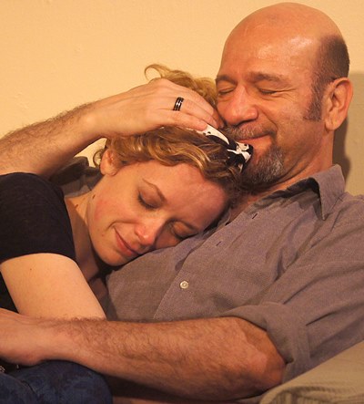 A peaceful moment in a household storm for Maggie (Abby Dillion) and Mick (Adam Bitterman). (Jan Ellen Graves)