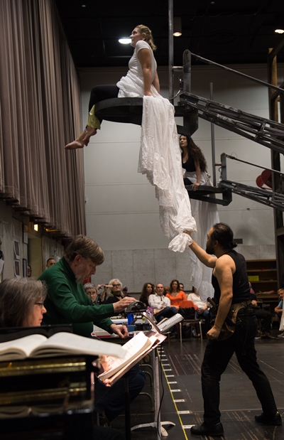 Prompter Susan Miller Hult, foreground, and conductor Andrew Davis, rehearse with Samuel Youn as Alberich and Rhinemaiden Diana Newman. (Andrew Cioffi)